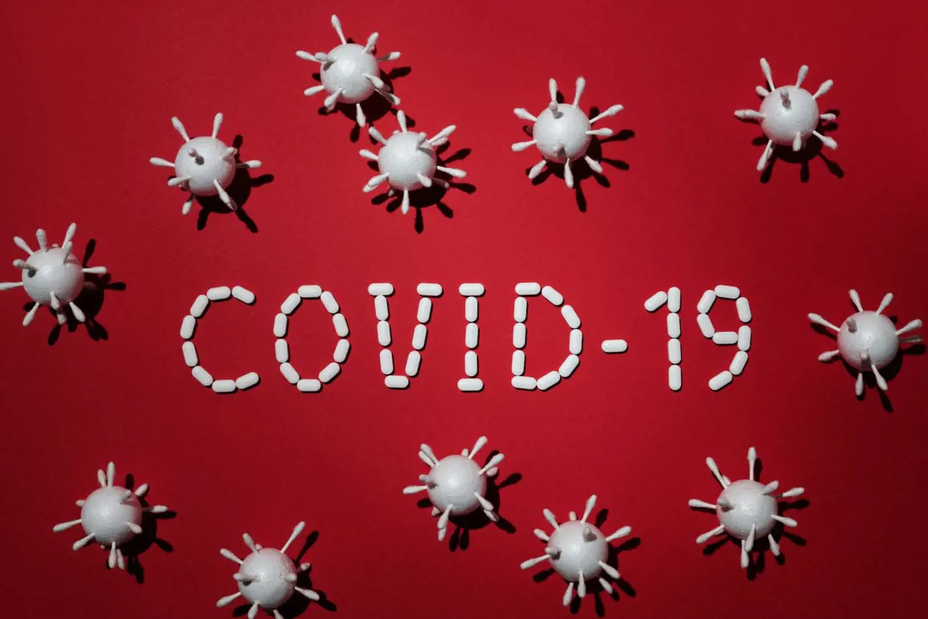 concept-of-covid-19-in-red-background-4031867-scaled